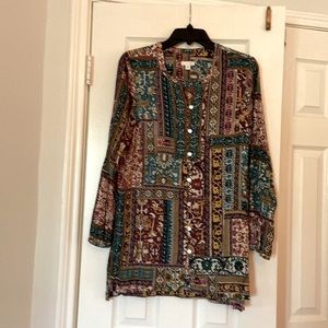 Long-sleeve unique print top with pearlized buttons.